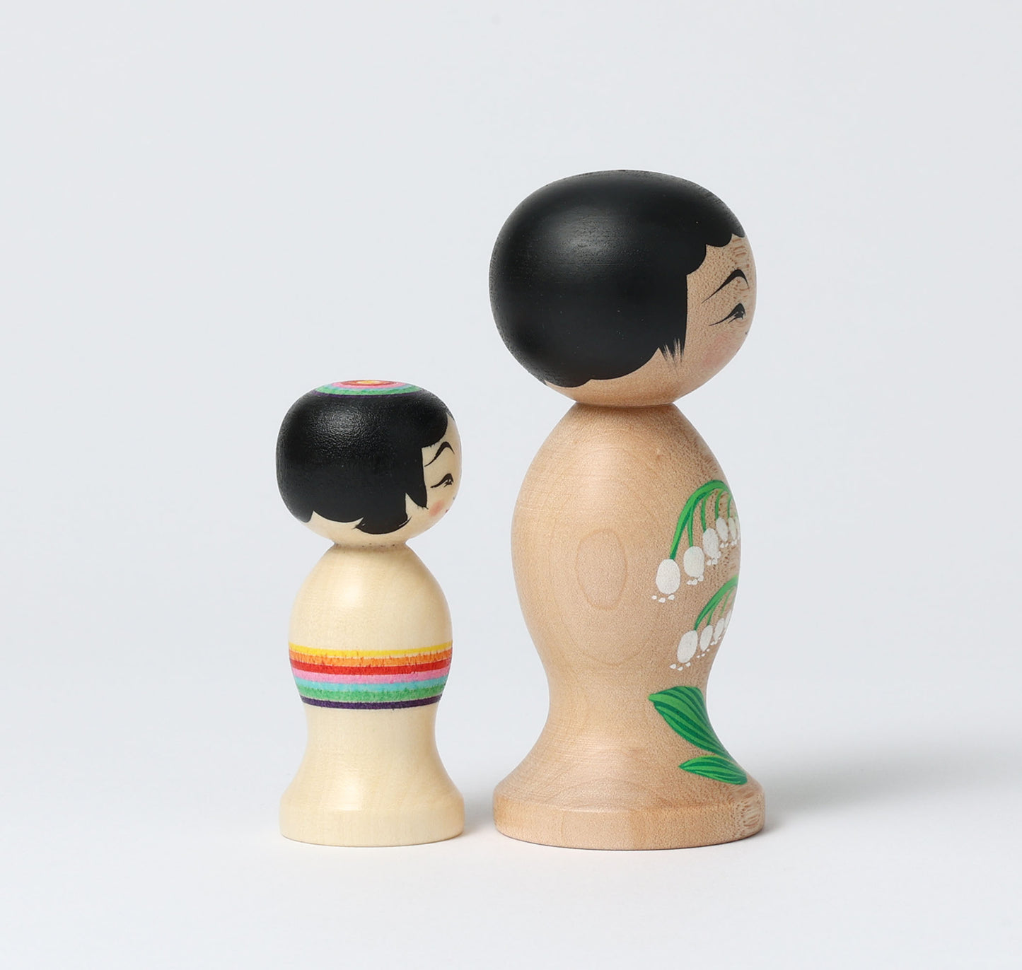 HIRAGA, Teruyuki 平賀輝幸工人 | set of 2 kokeshi dolls-lily of the valley and mini rainbow kokeshi dolls すずらんと虹のミニこけし |  Sakunami style 作並系 | 10.5cm in height